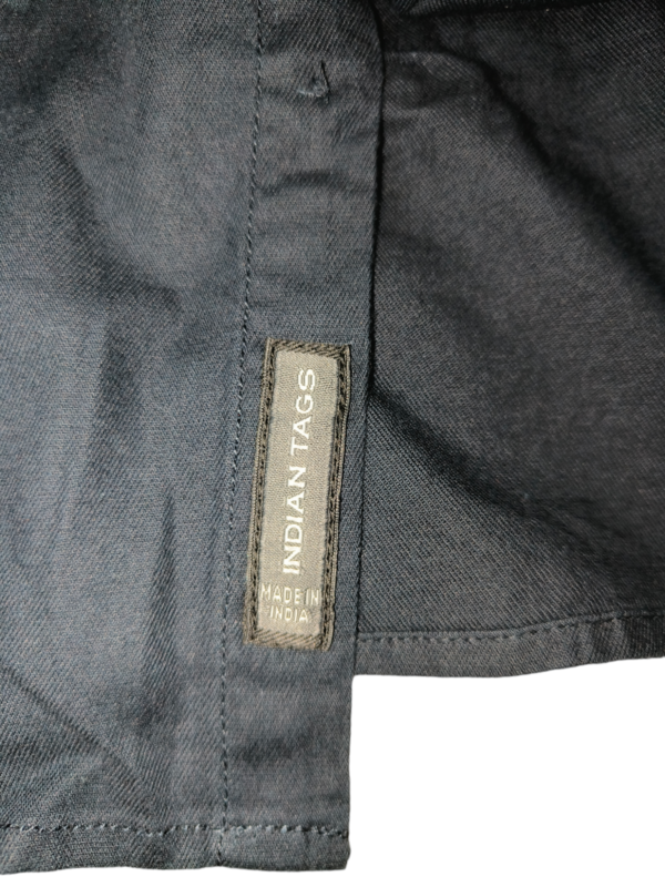 Close up of the Indian tags label